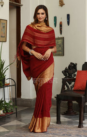 Burgundy Linen Saree with a Striking Zari Border & pallu