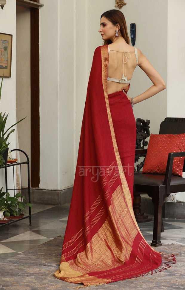 Burgundy Linen Saree with a Striking Zari Border & pallu
