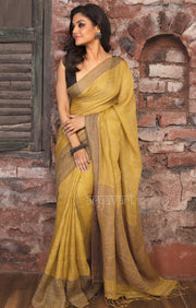 Mustard Yellow Linen Saree With Multi Colored Woven Border