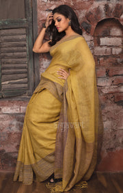 Mustard Yellow Linen Saree With Multi Colored Woven Border