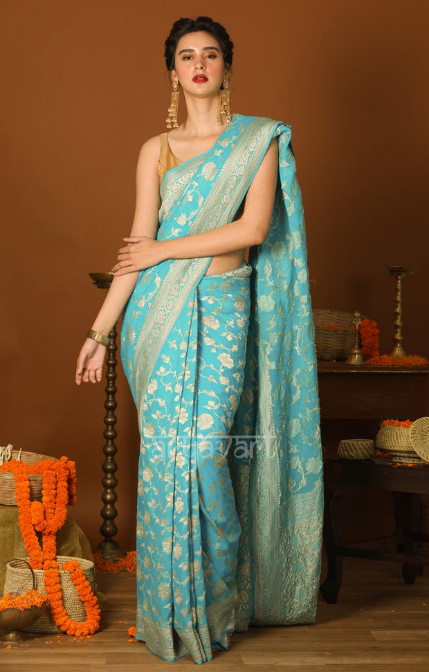 Turquoise Blue Chiffon Saree with Silver Zari Floral Weave