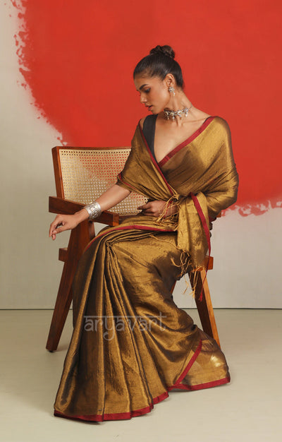 Dark Gold Tissue Cotton saree With A Thin Red Border