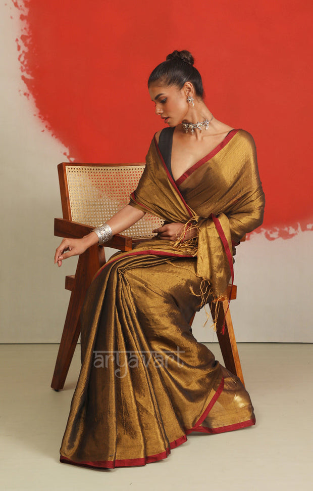 Dark Gold Tissue Cotton saree With A Thin Red Border