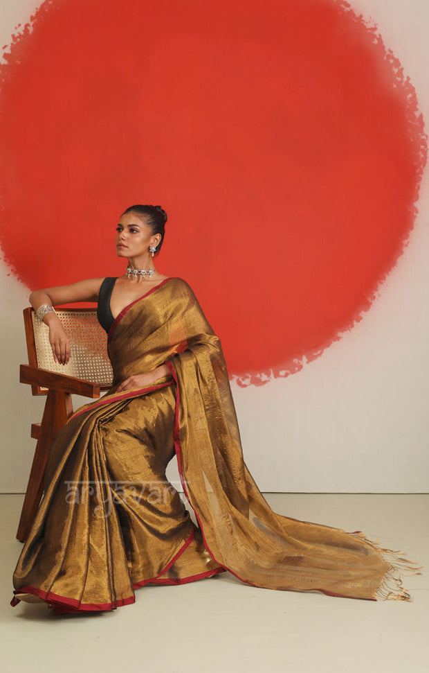 Dark Gold Tissue Cotton saree With A Thin Red Border