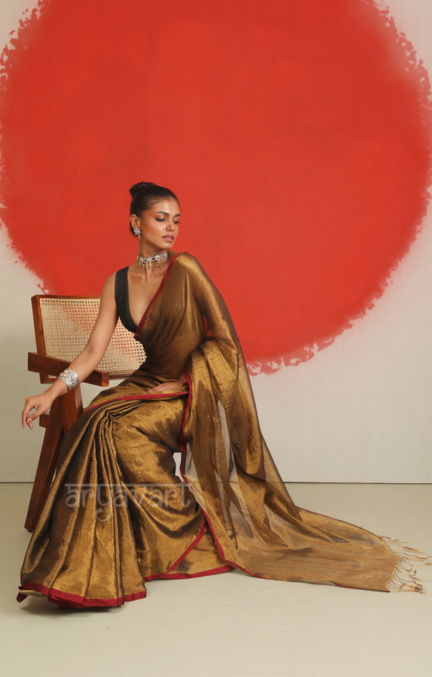 Dark Gold Tissue Cotton saree With A Thin Red Border