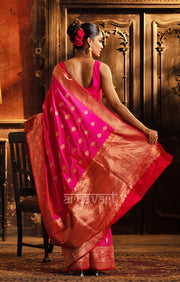 Striking Fuchsia Katan Silk Saree With A Red Border & Gold Buttas