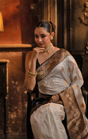 Striking White Katan Silk Saree With A Black Border & Gold Buttas