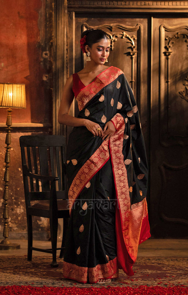 Stunning Black Katan Silk Saree With A Red Border & Gold Buttas