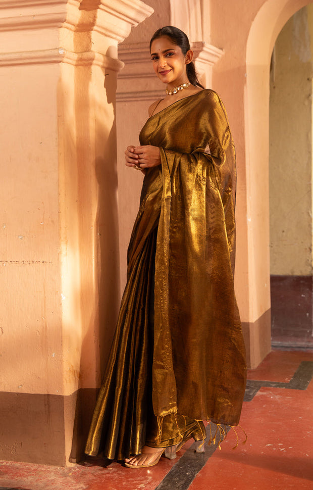 Liquid Gold Tissue Cotton saree With A Thin Black Border